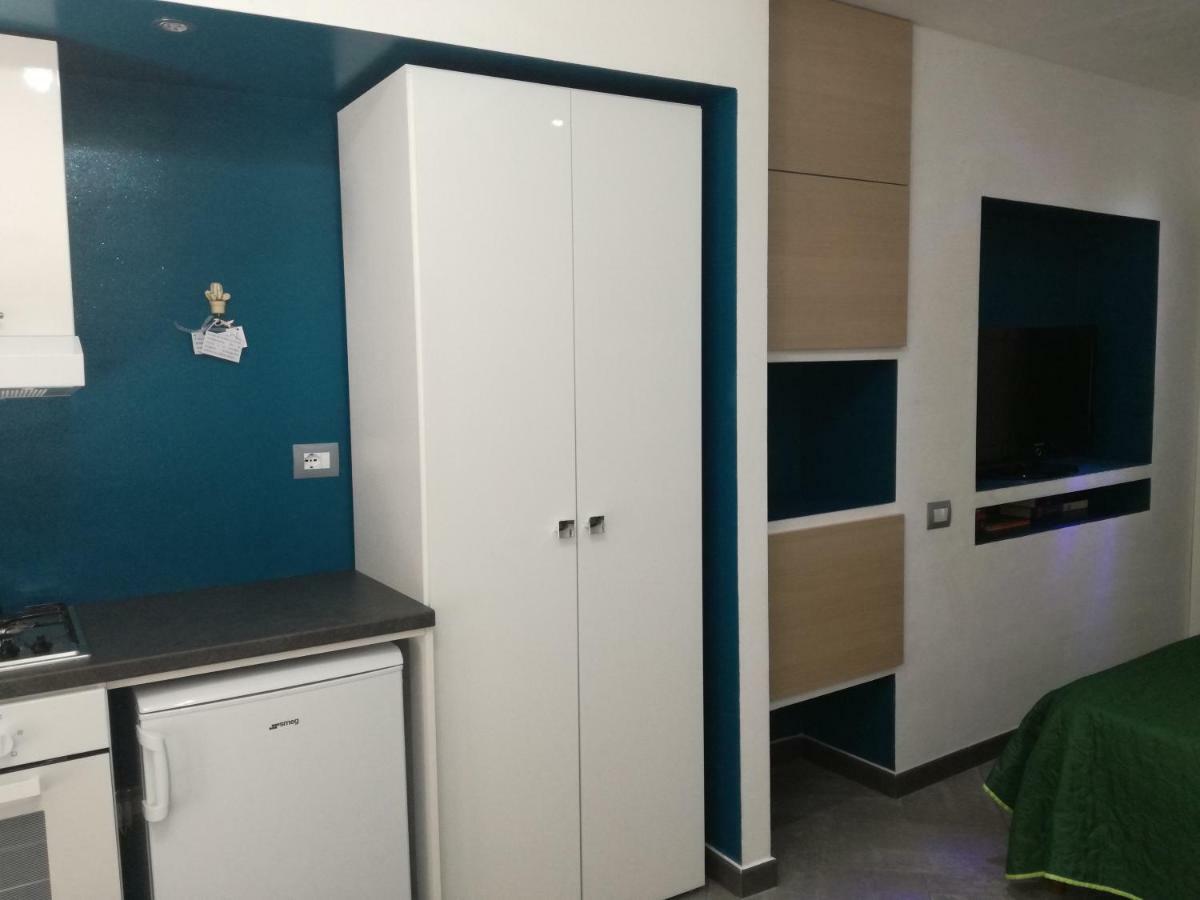 Апартаменты Arco Bianco - Monolocali Тортоли Экстерьер фото